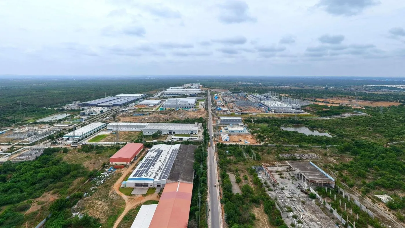 Aerial view across the whole layout towards Kongarakalan village