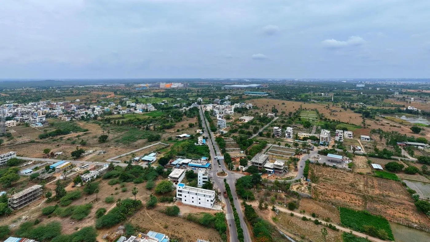 Kongarakalan village and surrounding development seen from above